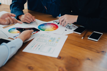 ux ui designer team meeting creative graphic planning application development for web mobile phone .