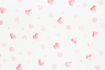 Wall Mural - Valentine's Day background. Pink hearts on white background. Valentines day concept. Flat lay, top view
