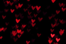 Red Heart Valentine Bokeh Lights Against A Black Background