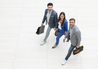 Wall Mural - top view.business people go together.