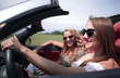 © ASDF - Beautiful woman sitting in cabriolet