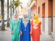 © Alessandro Biascioli - Happy muslim women walking in the city center - Arabian teen girls having fun spending time together outdoor - concept of people, culure and religion
