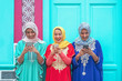 © Alessandro Biascioli - Happy muslim women using their mobile smart phones in the college - Arabian young people watching on cellphone and laughing together outdoor - Millennials, generation z and technology concept