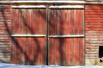 Wall Mural - Red painted barn doors.