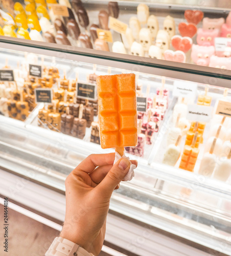 Variety Of Ice Cream Scoops In Cones With Chocolate Vanilla And
