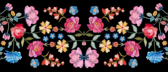 Wall Mural - Colorful seamless embroidery border with beautiful flowers. Floral embroidered pattern on black background. Fashion print.