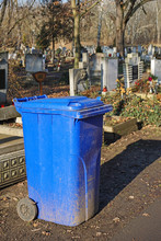 Garbage Can In The Public Cemetery