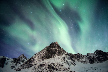 Wall Mural - snowy mount with aurora borealis dancing with shooting star