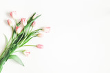 Flowers composition. Pink tulip flowers on white background. Valentines day, mothers day, womens day concept. Flat lay, top view, copy space