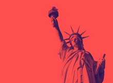 Bottom View Of The Famous Statue Of Liberty, Icon Of Freedom And Of The United States. Red Duotone Effect