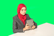 © mawardibahar - Businesswoman looking the tablet with muslimah lifestyle.