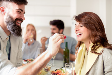 Wall Mural - Friends having lunch together at home