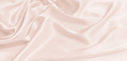 Wall Mural - The texture of the satin fabric of pink color for the background