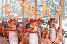 Christmas Carousel Of Reindeer And Santa Claus.