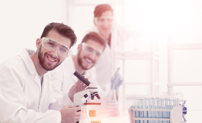 Wall Mural - closeup.a group of scientists in the workplace.