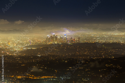 Foggy night aerial cityscap...