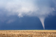 Dramatic tornado and severe storm over a field in Nebraska