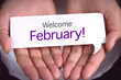 © dolphfyn - Hand showing welcome February.