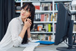 © contrastwerkstatt - Pretty young businesswoman sitting thinking deeply