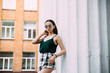 © prokop.photo - Sexy girl in sunglasses t-shirt and short shorts near the columns