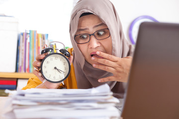 Wall Mural - Young Businesswoman Worried by Time, Work Deadline Stress