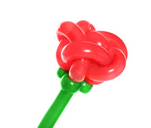 Rose Figure Made Of Modelling Balloon On White Background