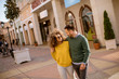 © BGStock72 - Young multiethnic couple walking on the street