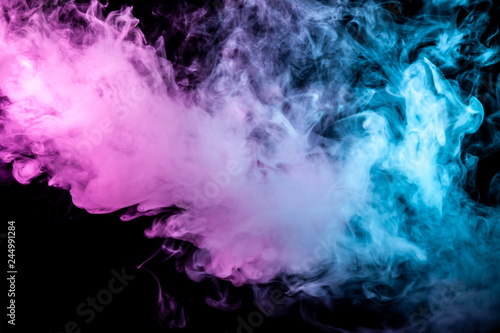 Multicolor Thick Smoke Illuminated By Colored In Blue Purple