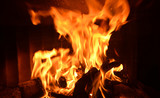 Fototapeta Miasto - Fire in fireplace