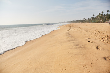 Wall Mural - Narigama Beach. Beach overlooking the ocean and the waves.   