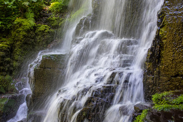 Closeup view at a water stream of Fairy Falls at Columbia River Gorge