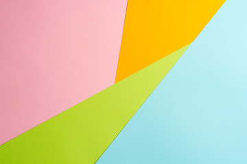 texture background of fashionable pastel color with top view, minimal concept, flat lay: blue, orange, green and pink