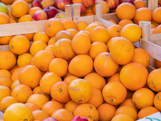 Oranges are one of the simple pleasures of eating in Italy. A lot of oranges were sold at the market of Genoa, Italy.