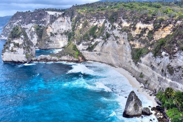 Incredible high coastal cliffs and yet untouched nature of Nusa Penida Island, Indonesia