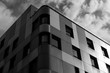 © ADDICTIVE STOCK - Facades of high buildings and cloudy sky