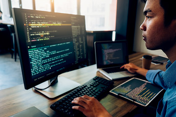 programmer working in a software development and coding technologies. website design.technology conc