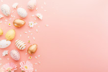 Easter Flat Lay Of Eggs With Flowers On Pink