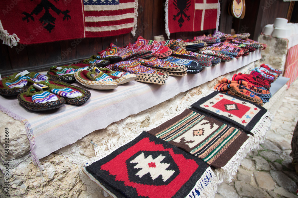 Obraz na płótnie KRUJE, ALBANIA - June 2018: Traditional Ottoman market in Kruja, birth town of National Hero Skanderbeg. Flea market in Albania. Antique items and souvenirs for sale. w salonie