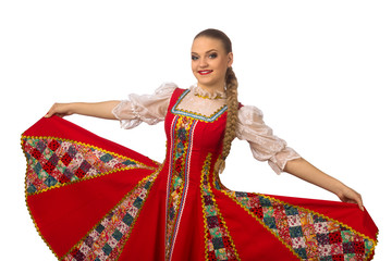 Wall Mural - Beautiful smiling caucasian girl in russian folk costume isolated on white