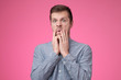 © RealPeopleStudio - Displeased young male dressed in blue shirt, says fie and has dissatisfied facial expression