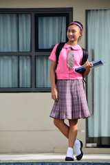 Wall Mural - School Girl And Happiness With Books Standing