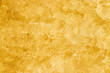© Eugene_Photo - Texture of yellow decorative plaster.