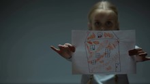 Girl Showing House Picture Into Camera, Orphan Child Needs Home And Family