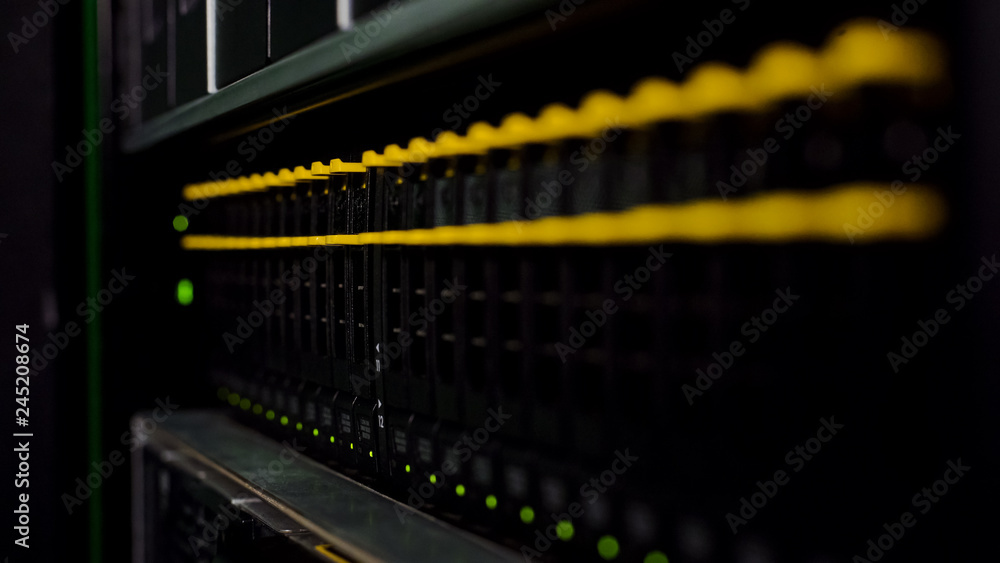 Data storage illuminated with led, networking connection, server racks closeup