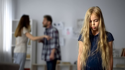 girl listening parents quarreling, childhood trauma, mental abuse, hotline