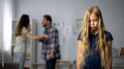 Fotografía Girl listening parents quarreling, childhood trauma, mental abuse, hotline