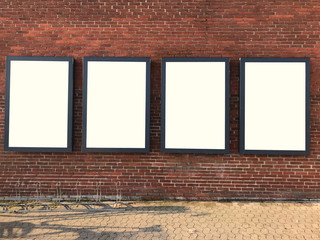 Four blank billboards