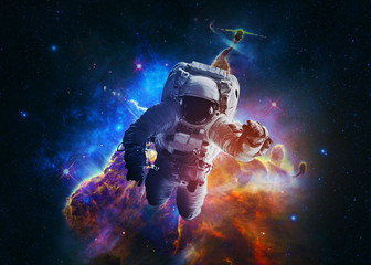 Wall Mural - astronaut afloat - elements of this image furnished by nasa