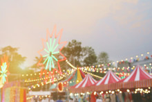 Blurred Background Image Of Weekend Market Festival With Colorful Light Decorations