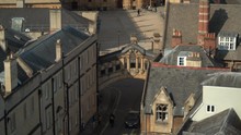 Rooftop View Of An Oxford Cyclist Riding Under The Bridge Of Sighs
